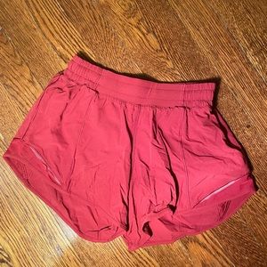 Lululemon shorts in a size 4 tall! In a beautiful burnt organize color!